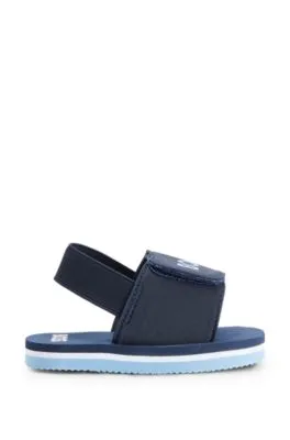 Kids' slides with ankle strap and logo detailing