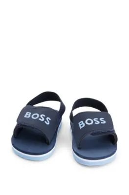 Kids' slides with ankle strap and logo detailing